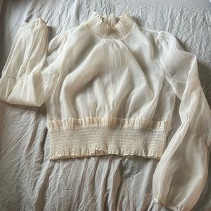 Sheer waist length blouse, size Large